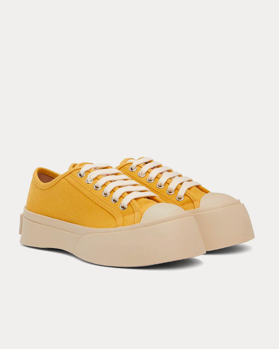 Yellow low top sales sneakers
