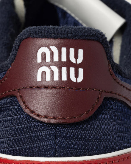 雑誌掲載【Miu Miu】Gymnasium technical fabric suede sneakers Miu Miu Gymnasium Technical Fabric and Suede Sneakers | Saks