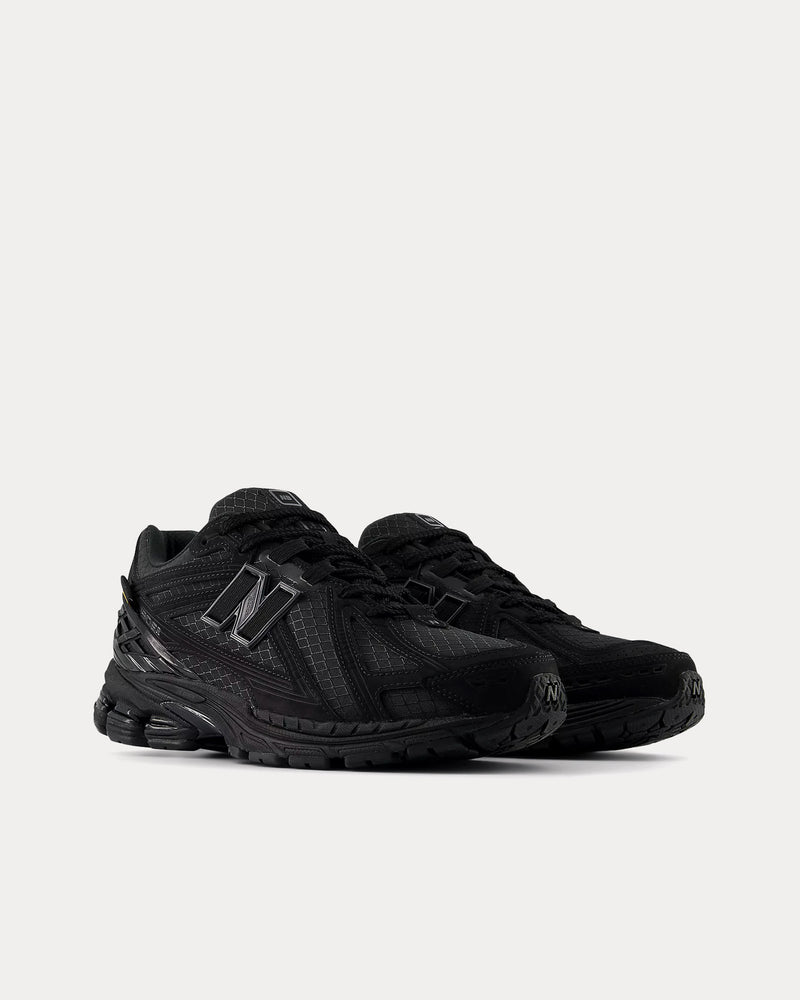 New Balance Men's 1906r Black / Magnet Low Top Sneakers