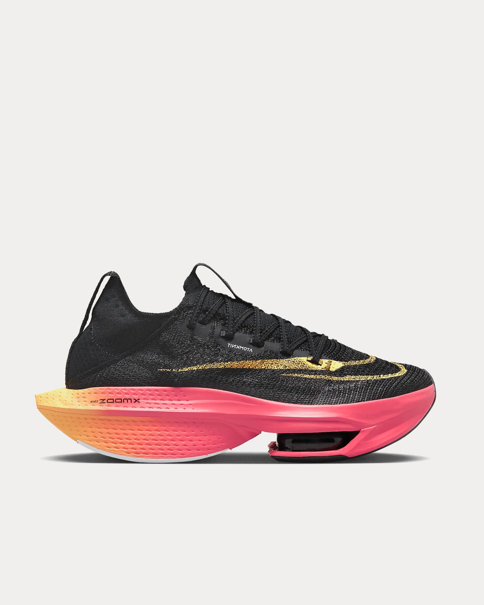 black and gold nike running shoes