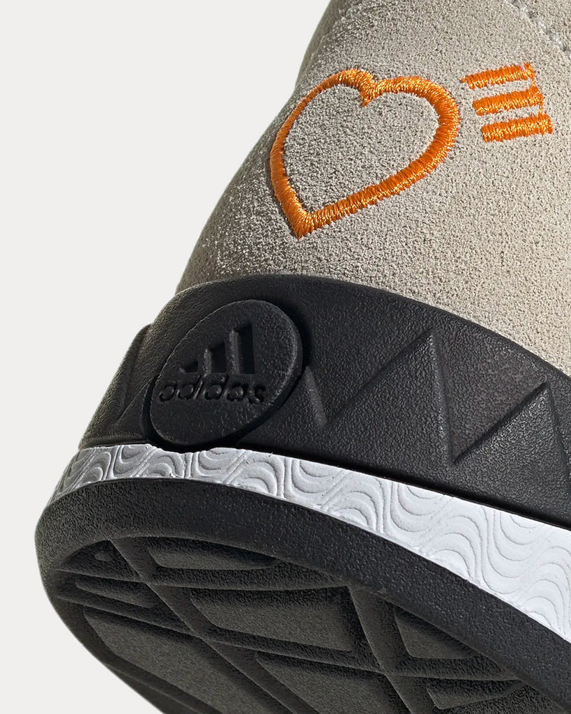 Adidas neon sales orange shoes