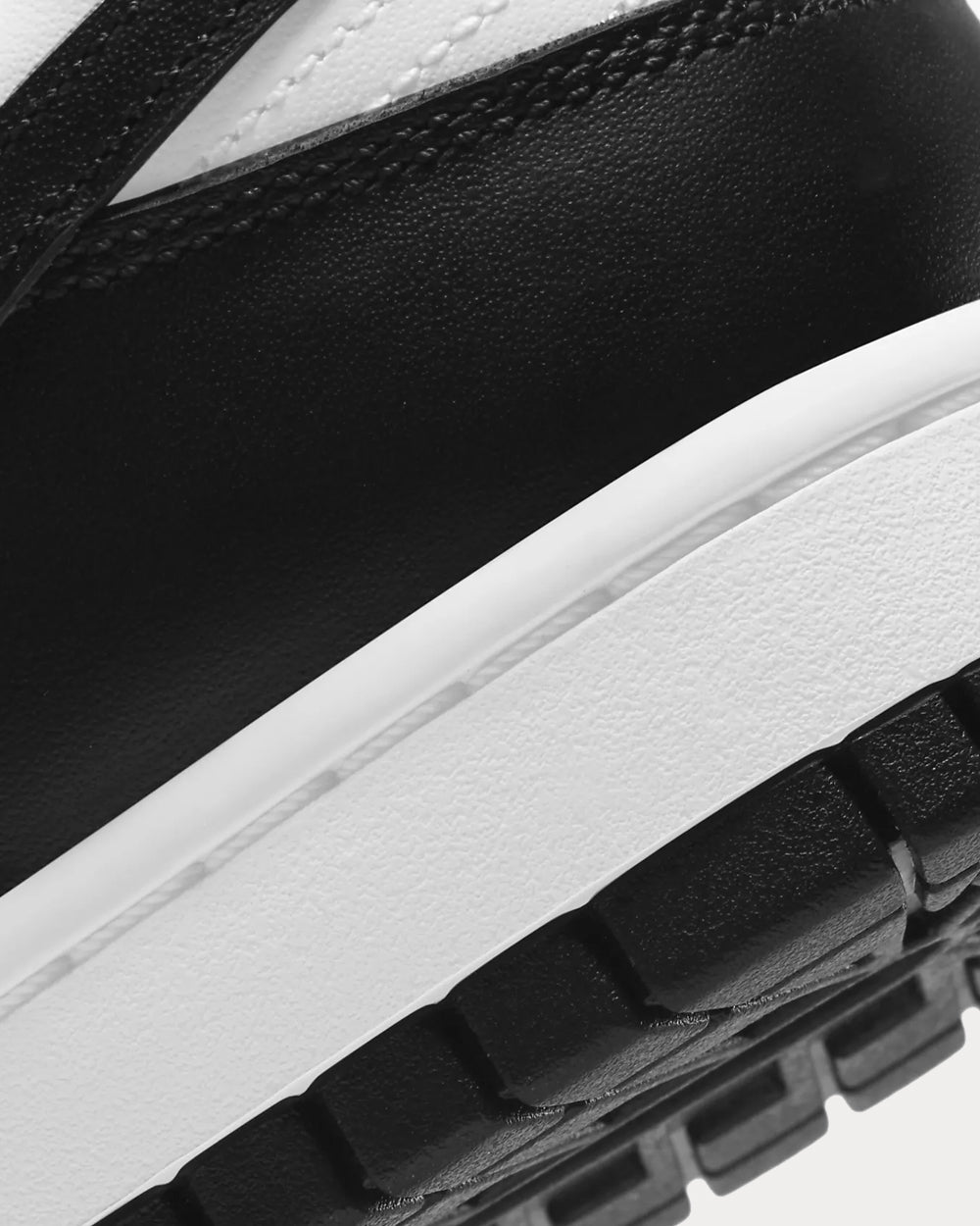 Nike - Dunk Low Retro White / White / Black Low Top Sneakers