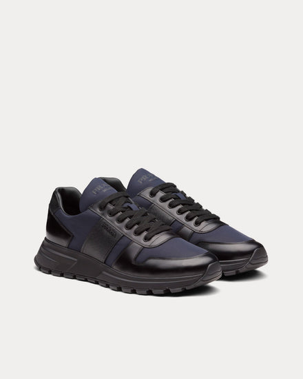 Prada Men's PRAX 01 Black / Blue Low Top Sneakers Prada Men's PRAX 01 Black / Blue Low Top Sneakers