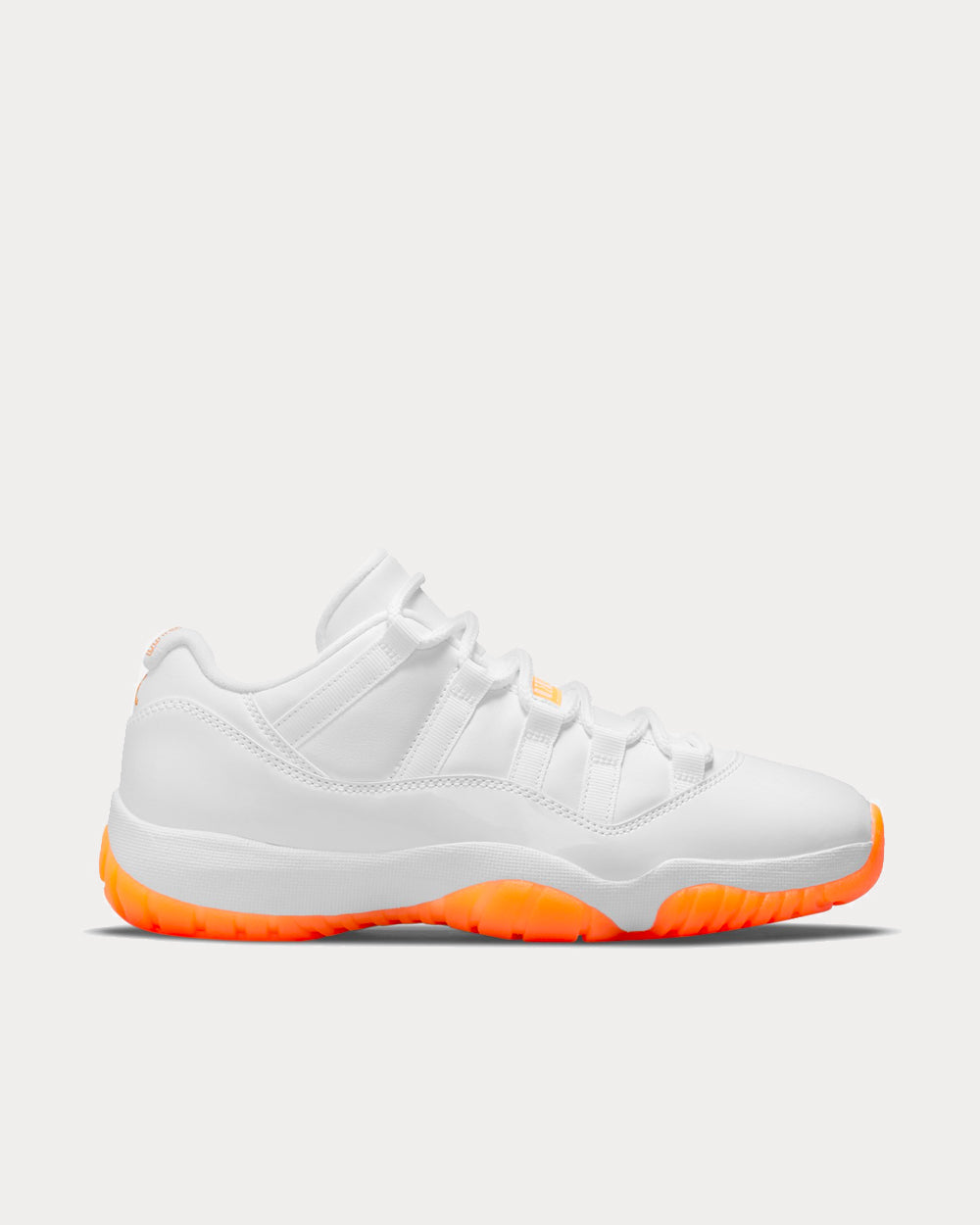 yellow and white jordan 11