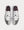 Air Jordan 11 CMFT Low Quai 54 White / University Red / Black Low Top Sneakers