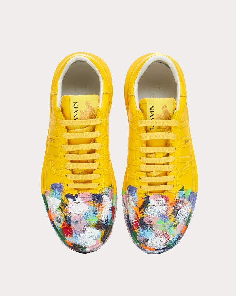 Yellow low deals top sneakers