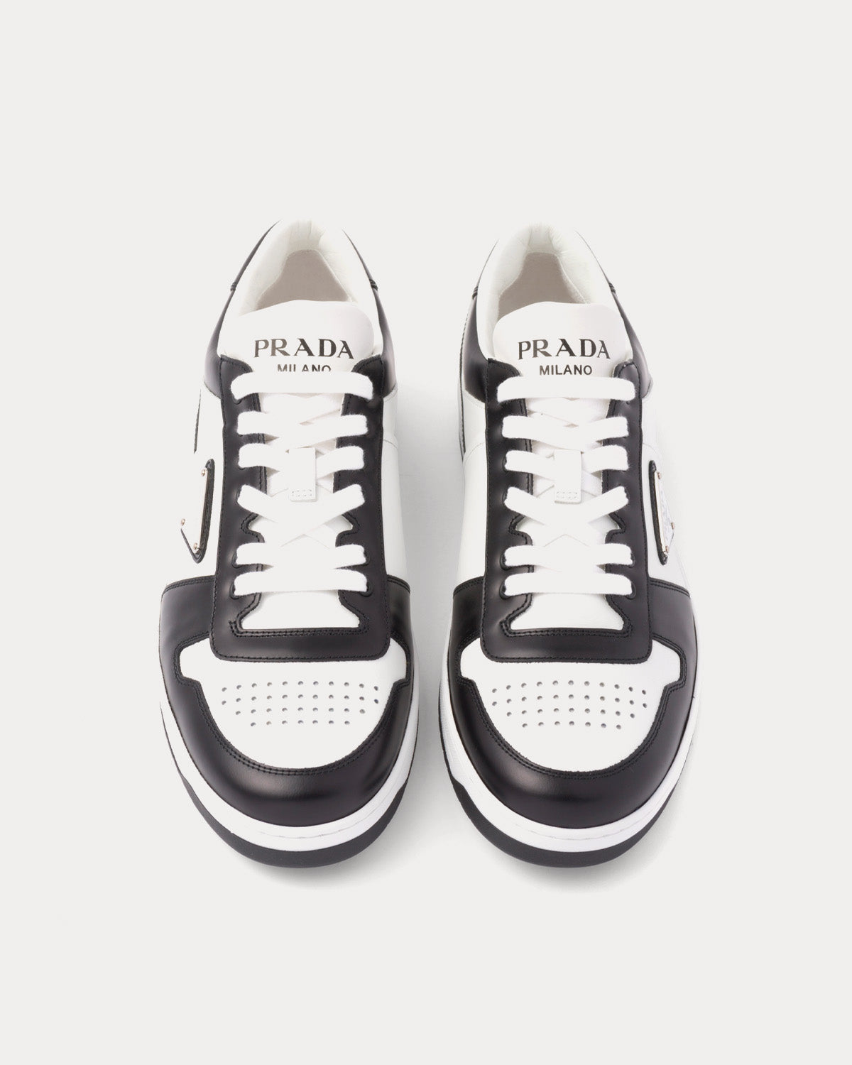 PRADA 26S DOWNTOWN THICK SOLE SNEAKERS IN WHITE CALFSKIN AND BLACK SUEDE main image 0
